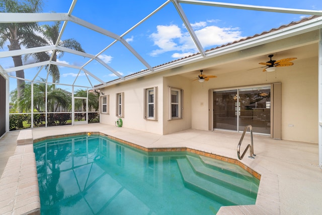 view of pool featuring ceiling fan, a lanai, and a patio