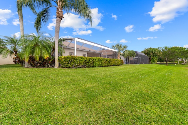 view of yard featuring a lanai