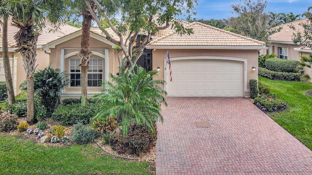 view of front of property featuring a garage