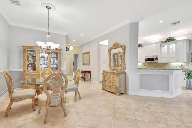 tiled dining space with ornamental molding and a notable chandelier