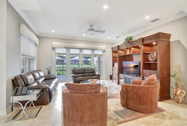 living room with ceiling fan, ornamental molding, and light tile patterned floors