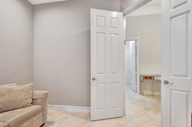 sitting room featuring light tile patterned floors