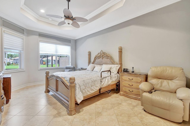 bedroom with a tray ceiling, ceiling fan, ornamental molding, and light tile patterned flooring