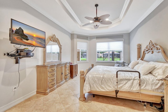 tiled bedroom featuring a tray ceiling, ceiling fan, and crown molding