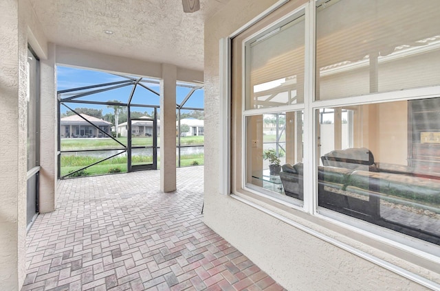 sunroom with a water view