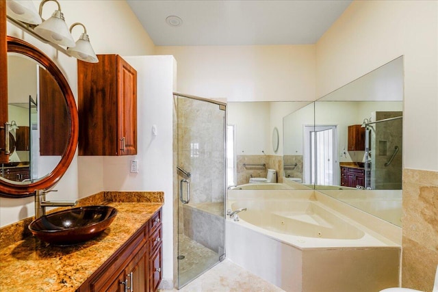 bathroom with plus walk in shower, vanity, and tile patterned flooring