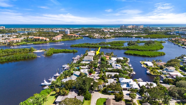 birds eye view of property featuring a water view