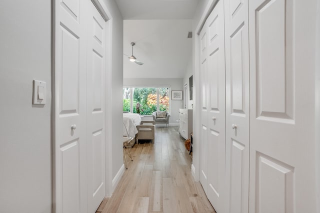 hall with light hardwood / wood-style flooring