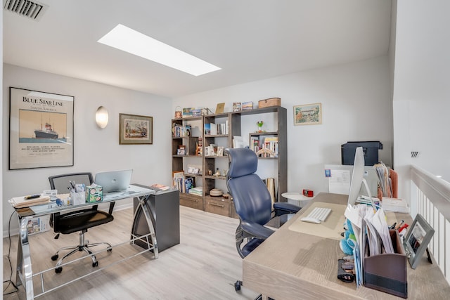 office space featuring light wood-type flooring