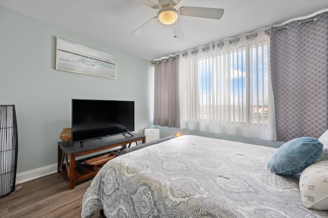 bedroom featuring ceiling fan and hardwood / wood-style floors