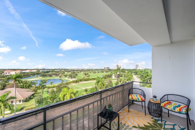 balcony featuring a water view