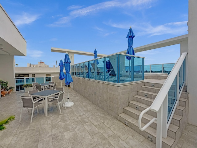 view of patio with a water view