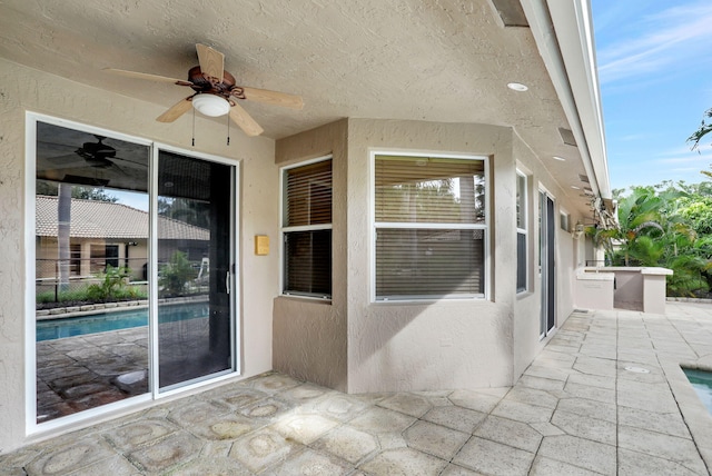 view of patio / terrace featuring ceiling fan