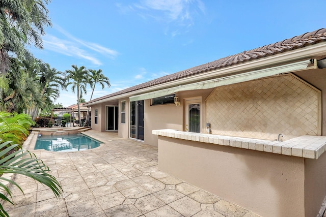 view of pool with a patio area