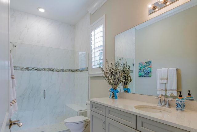 bathroom with vanity, an enclosed shower, and toilet