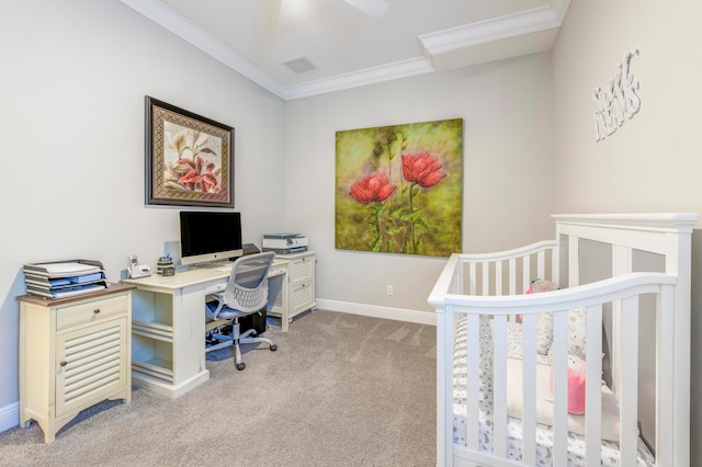 bedroom featuring ceiling fan, ornamental molding, a nursery area, and light carpet