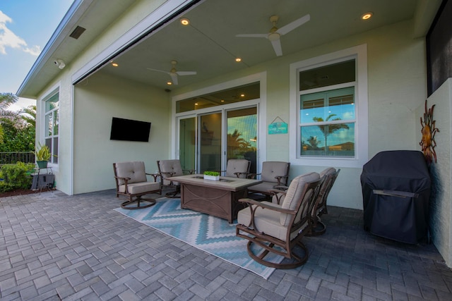 view of patio / terrace with an outdoor hangout area, ceiling fan, and grilling area