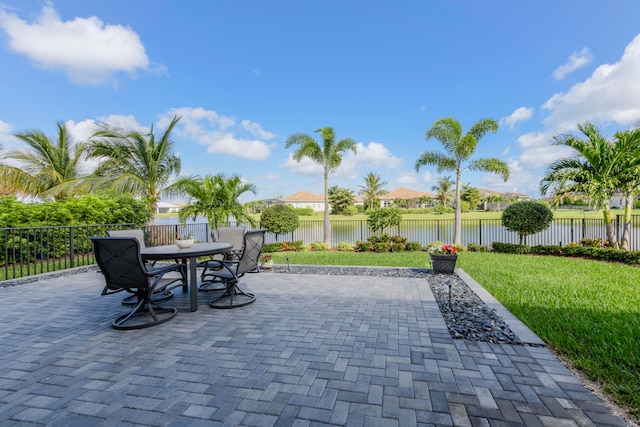 view of patio with a water view