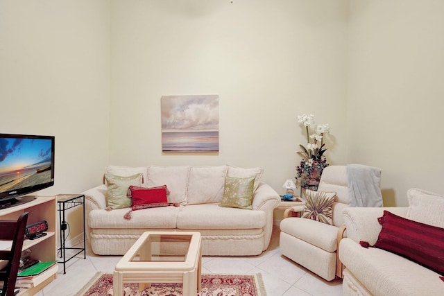 living room with light tile patterned flooring