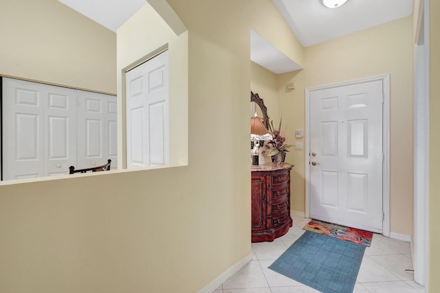 foyer with light tile patterned floors