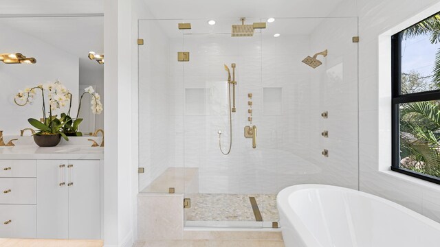 bathroom with vanity and hardwood / wood-style floors