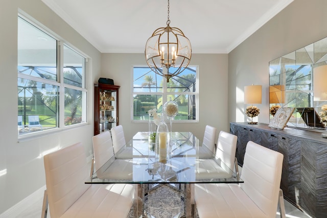 dining space featuring ornamental molding and an inviting chandelier