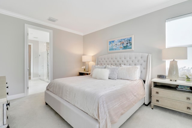 bedroom featuring connected bathroom, light colored carpet, and ornamental molding