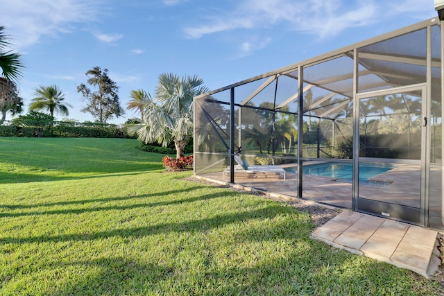 view of yard featuring a lanai