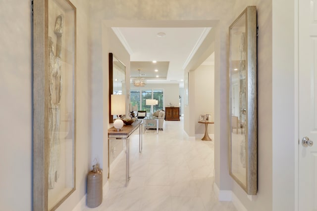 hallway featuring ornamental molding