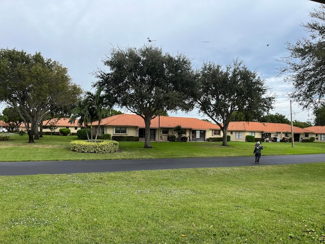 view of front of home with a front yard