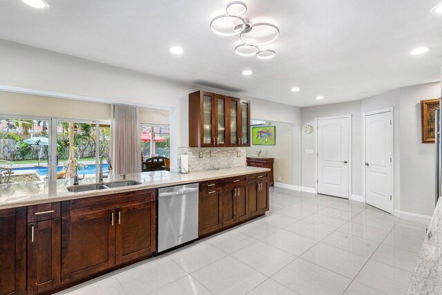 kitchen with light tile patterned floors, wine cooler, appliances with stainless steel finishes, range hood, and a sink