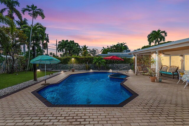 view of patio / terrace with a fenced in pool, outdoor dining area, grilling area, a ceiling fan, and a fenced backyard