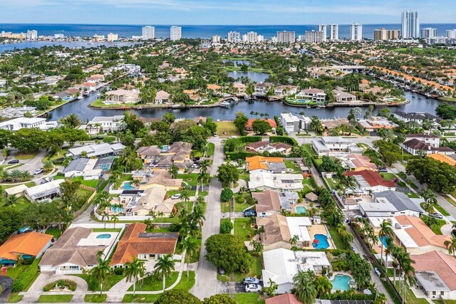 aerial view with a residential view and a water view