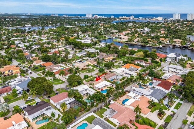 aerial view featuring a water view and a residential view