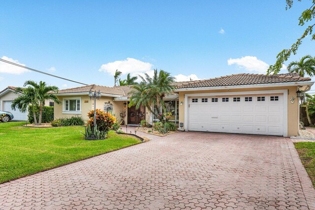 doorway to property with a tile roof and stucco siding