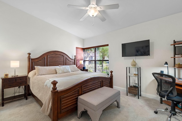 carpeted bedroom featuring ceiling fan and lofted ceiling