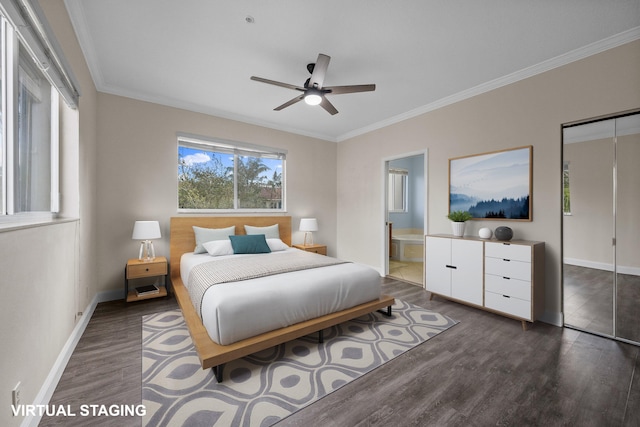 bedroom featuring ornamental molding, ceiling fan, connected bathroom, dark hardwood / wood-style floors, and a closet