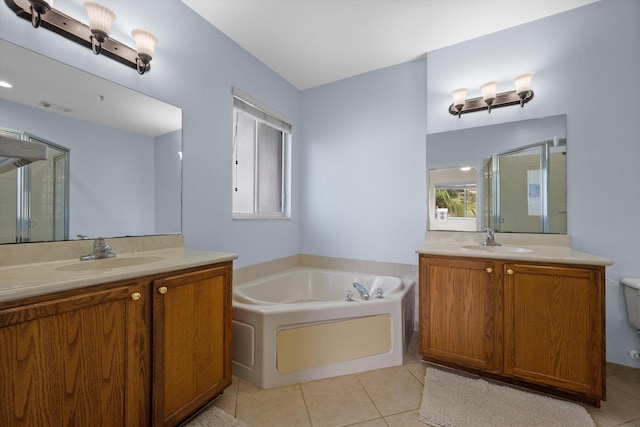 bathroom featuring vanity, tile patterned floors, and independent shower and bath