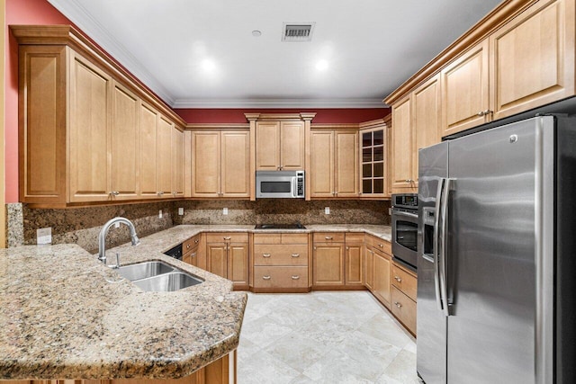 kitchen with sink, kitchen peninsula, appliances with stainless steel finishes, light stone countertops, and crown molding