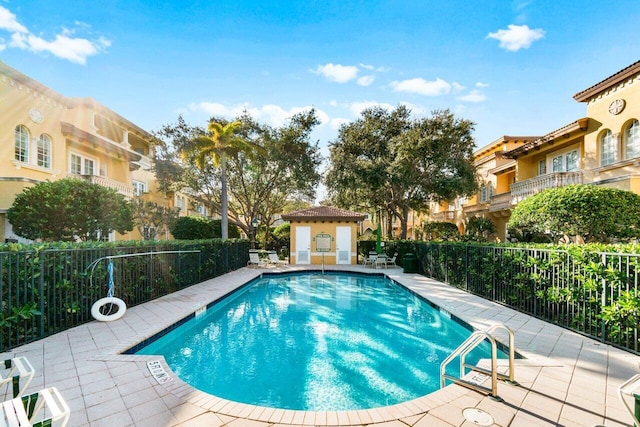 view of swimming pool featuring a patio