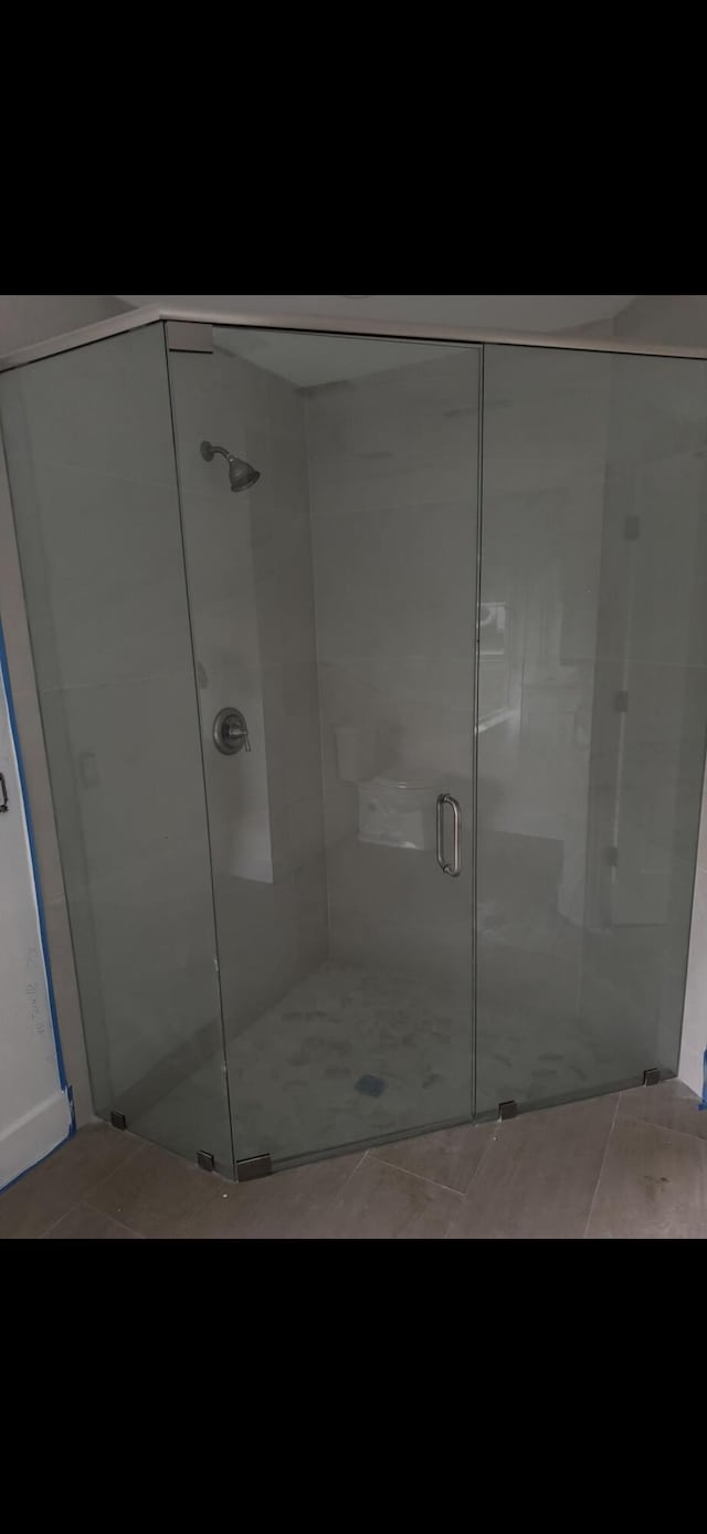 bathroom with an enclosed shower