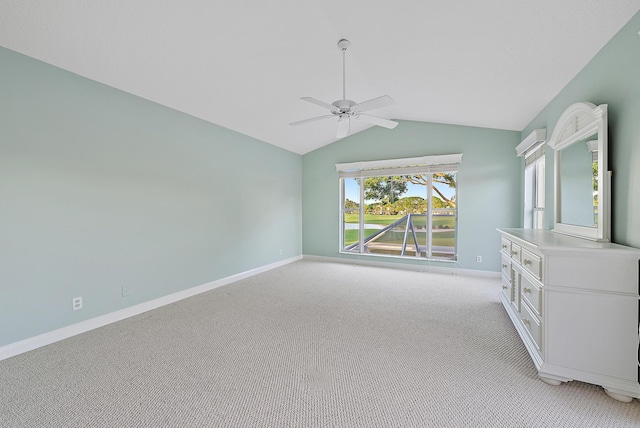 interior space featuring vaulted ceiling and ceiling fan