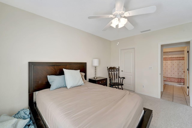 carpeted bedroom featuring ceiling fan