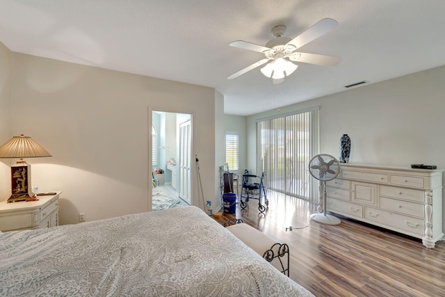 bedroom featuring hardwood / wood-style flooring and ceiling fan