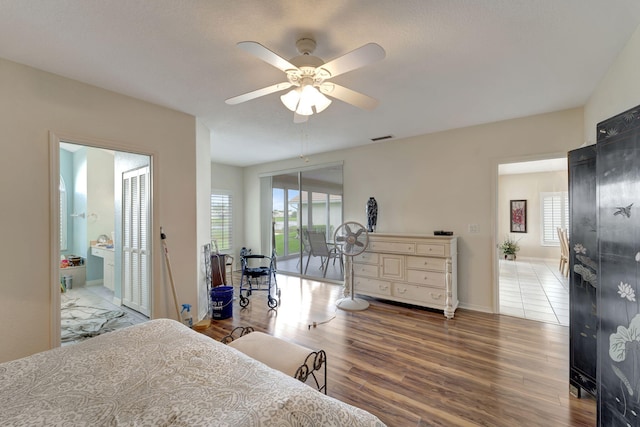 bedroom featuring hardwood / wood-style flooring and ceiling fan