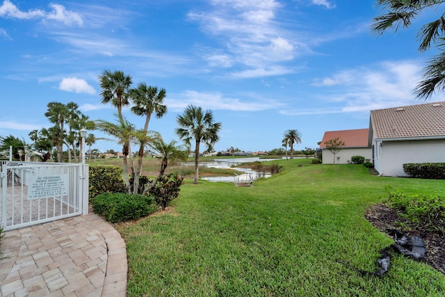 view of yard with a water view