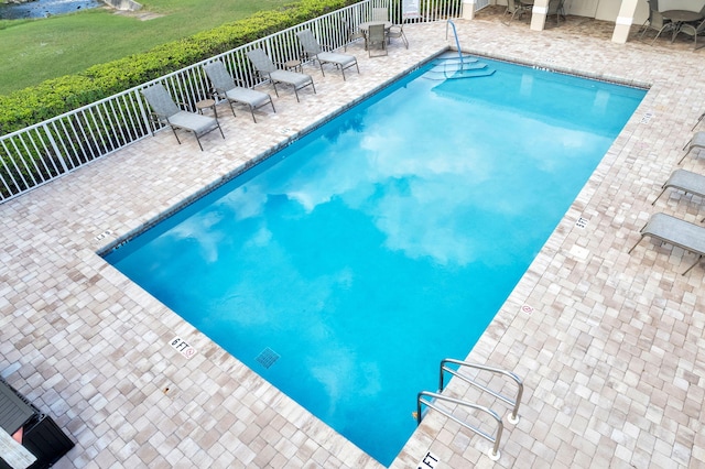 view of pool with a patio area