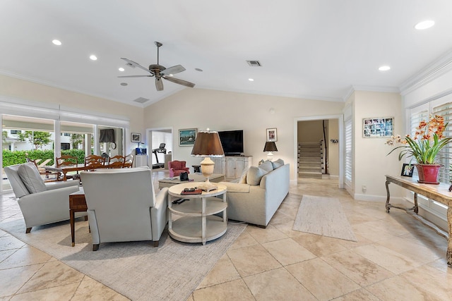 living room featuring lofted ceiling, ceiling fan, and crown molding