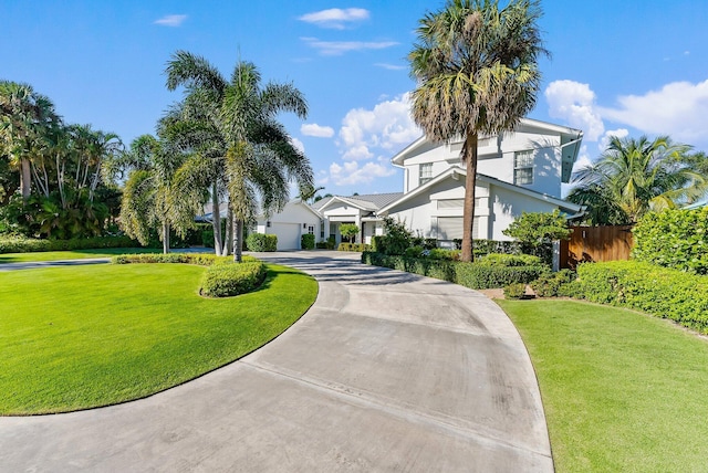 view of property's community featuring a yard