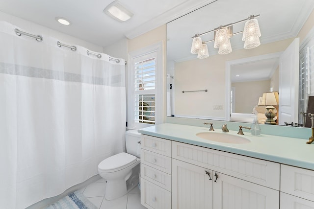 bathroom featuring vanity, toilet, and ornamental molding